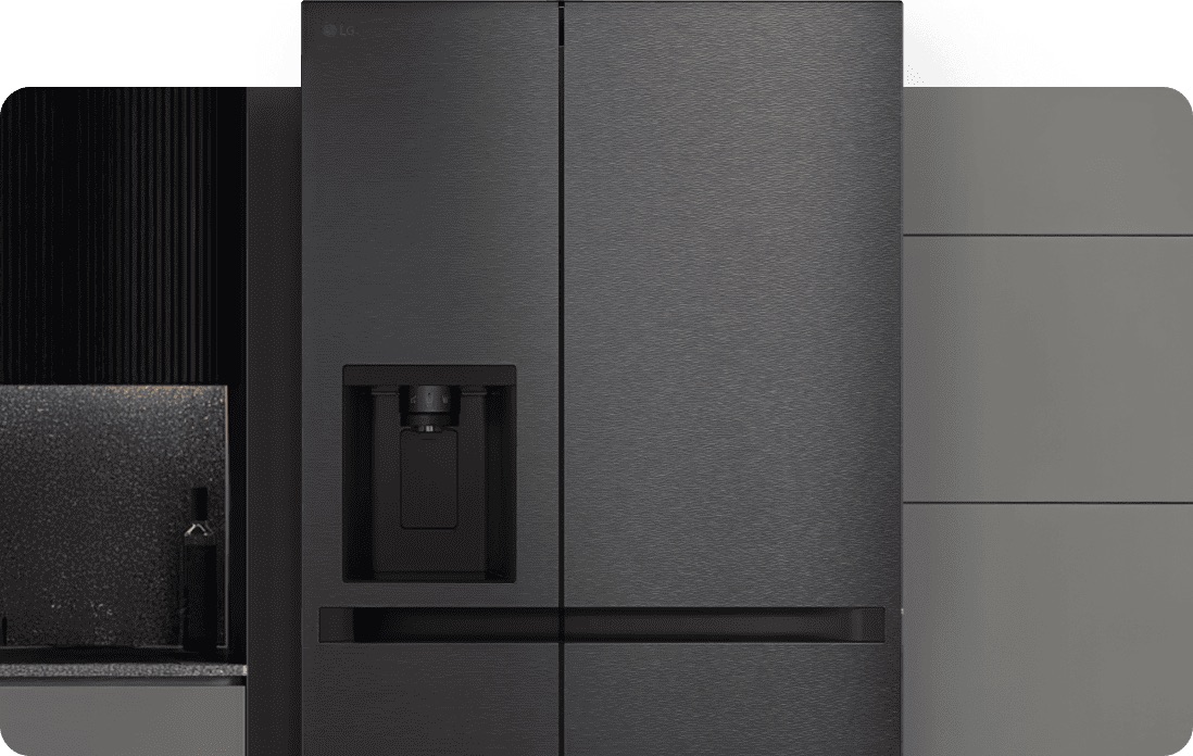 Close-up of an LG American-style fridge freezer in a premium matte black finish, seamlessly integrated into a modern kitchen with textured dark cabinetry, highlighting a sleek water and ice dispenser.