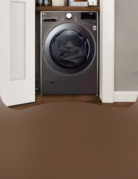 LG slim front load washing machine fitted neatly in compact cupboard space