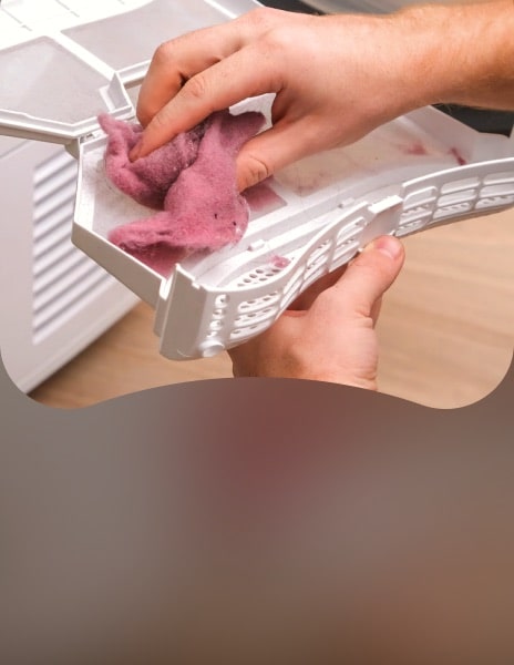Cleaning lint filter of heat pump tumble dryer for efficient drying
