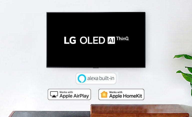 Ein an der Wand angebrachter Fernseher zeigt das Logo von LG OLED AI ThinQ vor schwarzem Hintergrund an.