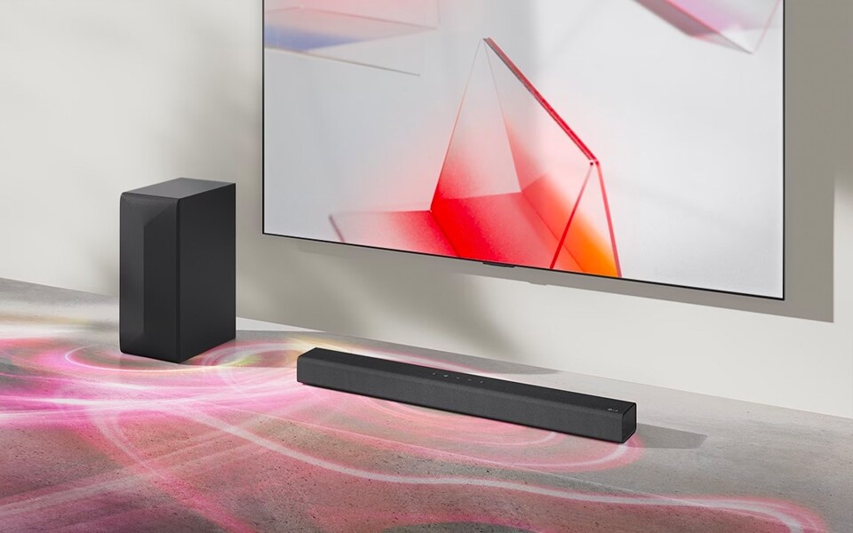 Eine Soundbar und ein Subwoofer verbessern den TV-Ton