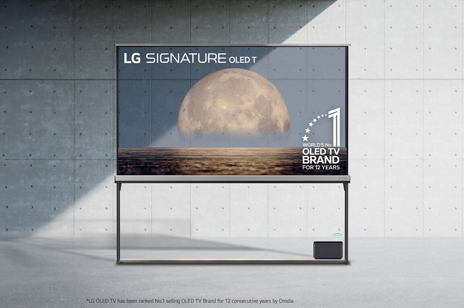 Front view of LG SIGNATURE OLED T, 12 years of world number 1 OLED Emblem, LG SIGNATURE OLED T logo, both embedded above the background depicting a moon above shore on a transparent screen. Zero Connect Box with 4K 120Hz wireless video & audio transfer connected to the TV, and a Wi-Fi signal coming out of the box.