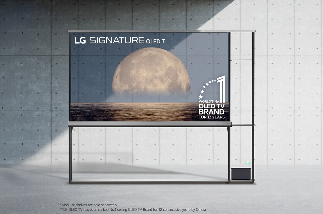 Front view of LG SIGNATURE OLED T, 12 years of world number 1 OLED Emblem, LG SIGNATURE OLED T logo, both embedded above the background depicting a moon above shore on a transparent screen. Zero Connect Box with 4K 120Hz wireless video & audio transfer connected to the TV sitting on an attached modular shelving unit, and a Wi-Fi signal coming out of the box.