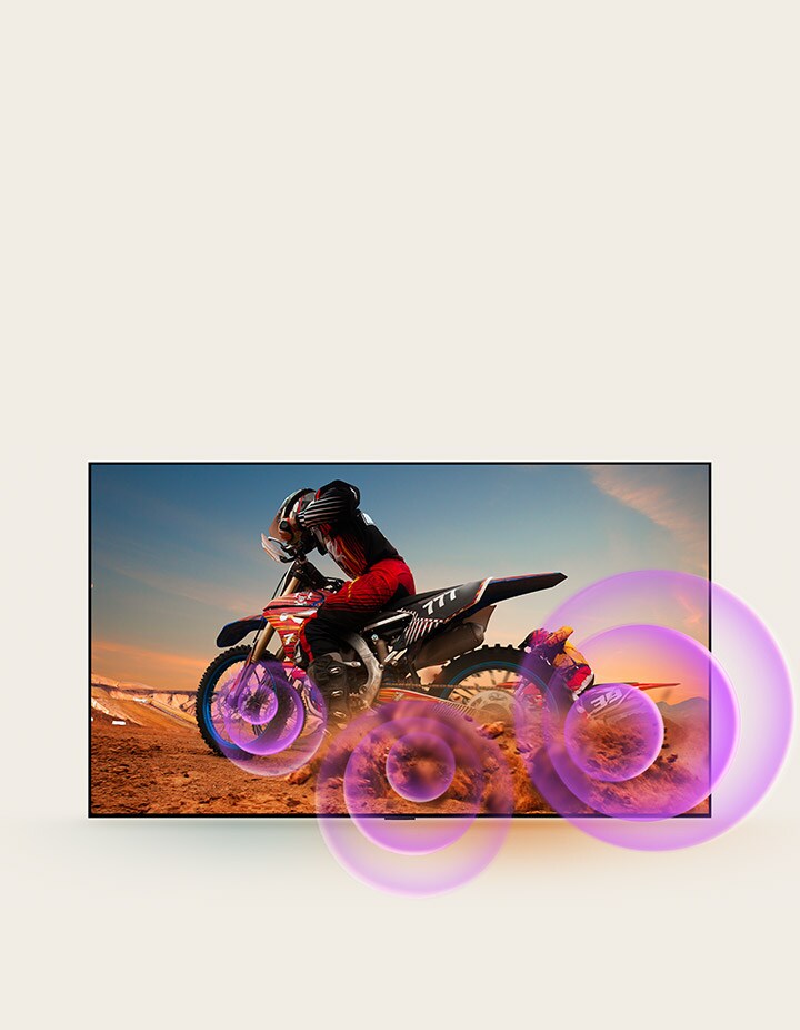 LG NanoCell TV depicts a man on a motorcycle with purple abstract circles coming out of the wheel to visualize sound emission.