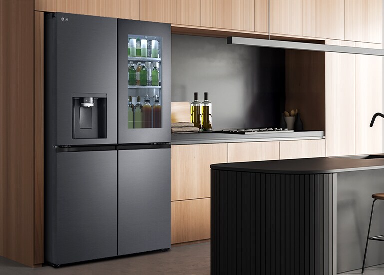 Modern kitchen interior with InstaView fridge.