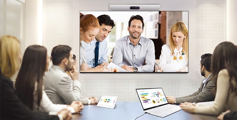 "This consist of images displaying the 3-step instructions on installing LG One:Quick Share USB Dongle and sharing the personal screen. The first image pairs the USB Dongle and the LG signage. The second image describes a person holding the USB dongle, attempting to connect it to the PC. The last image consists of people having a meeting by connecting an USB dongle device to a laptop, then sharing the screen through the UL3J on the wall."
