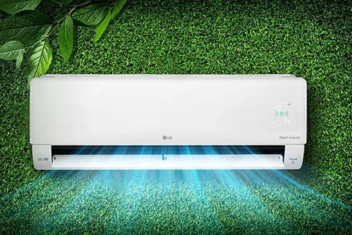 an air conditioner that breathes cool air on green grass