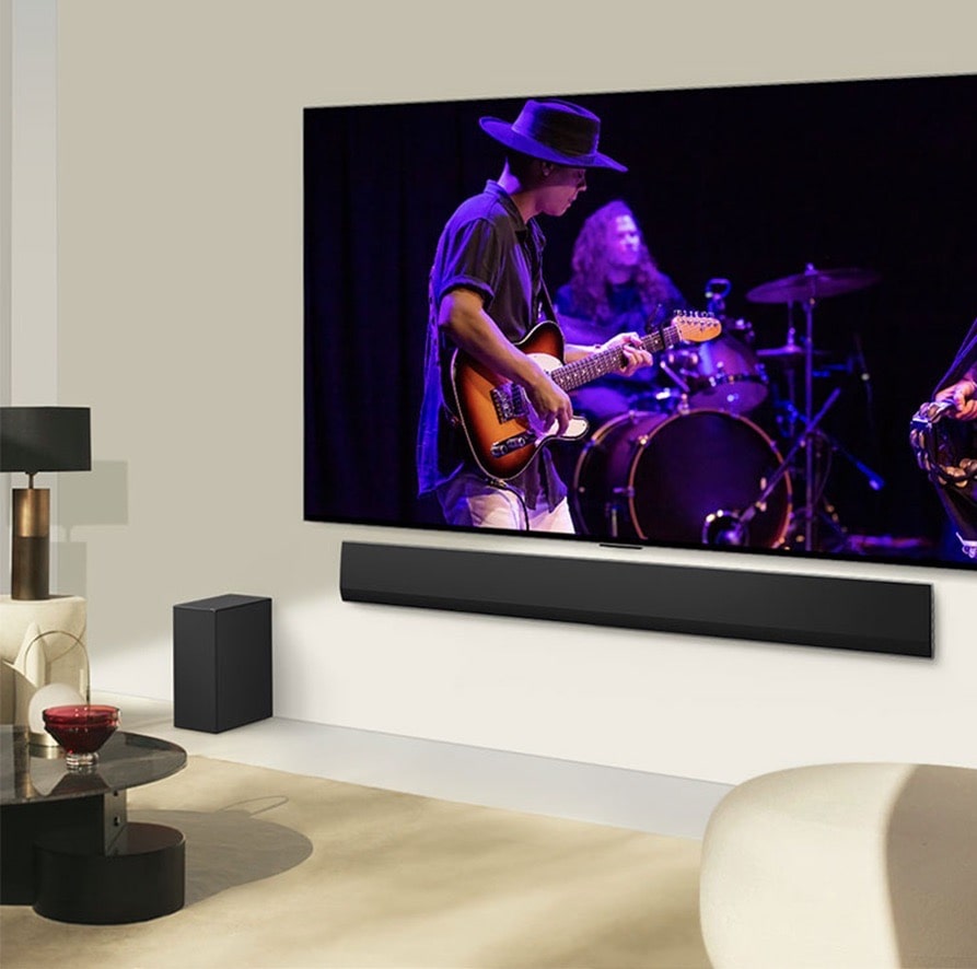 An image shows how the TV and soundbar match together in a modern living space.