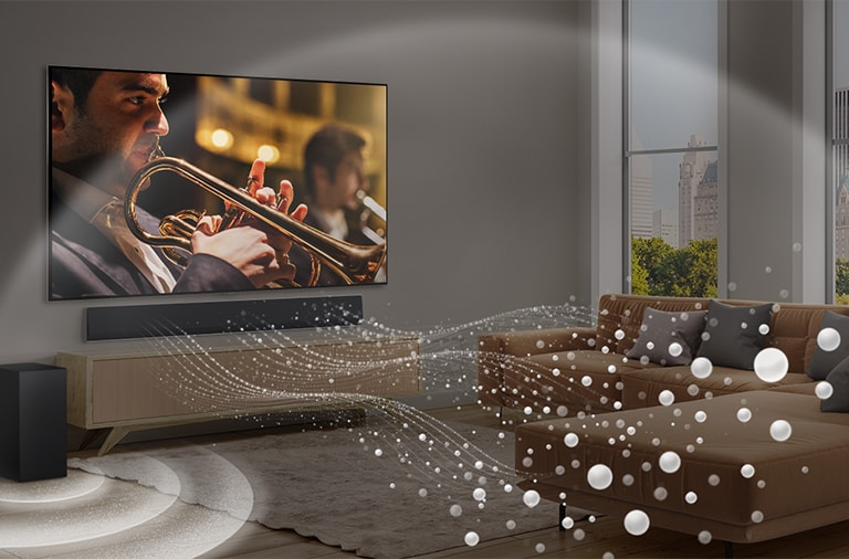 An image of an LG TV, LG Soundbar, and Subwoofer in a modern city apartment with soundwaves made of white droplets filling the room.