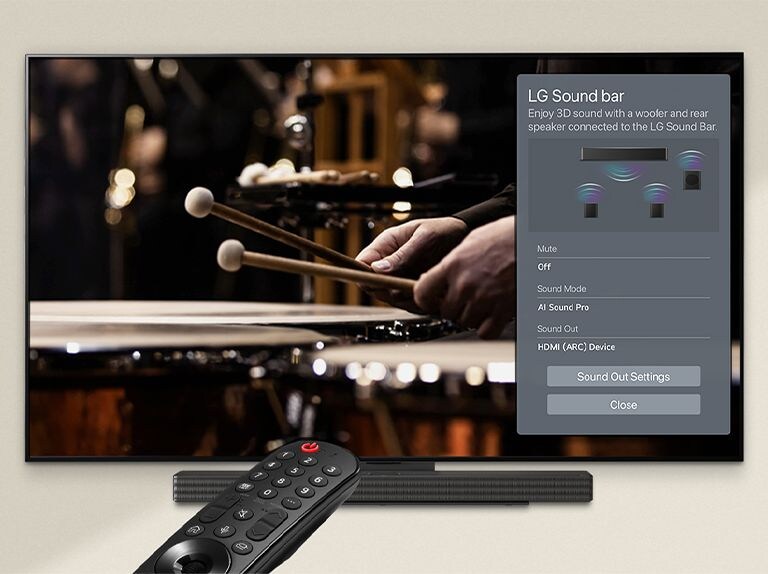 An image of a remote control pointed at an LG OLED TV showing soundbar control settings on the right side of the screen.