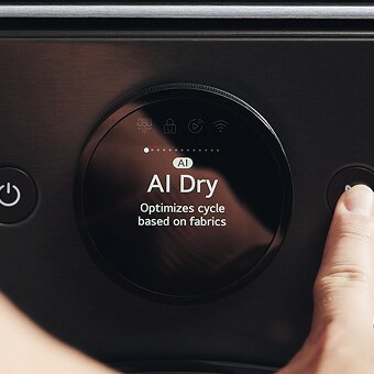 User selecting AI Dry cycle on LG dryer using digital control dial