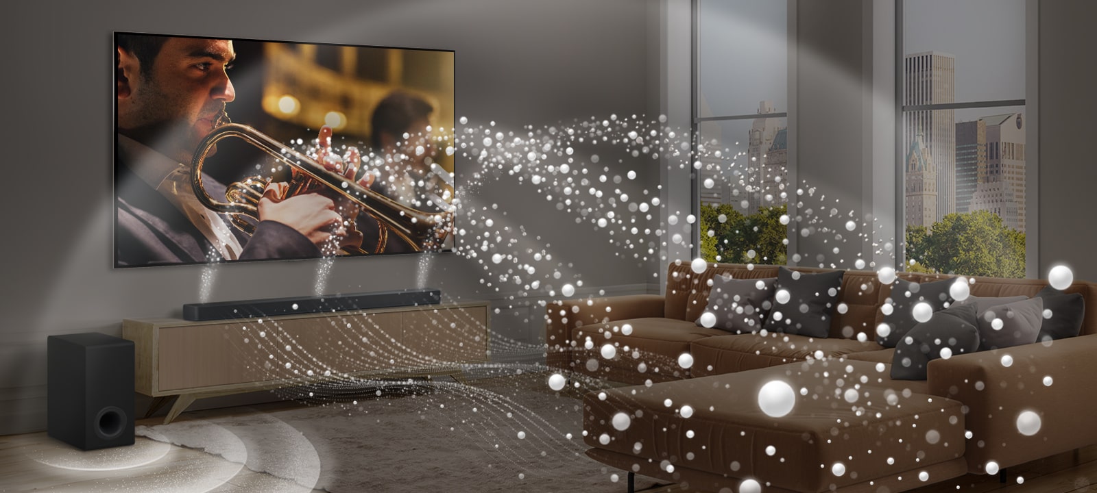 Um LG Soundbar, uma TV LG e um subwoofer estão em um apartamento moderno na cidade. O LG Soundbar emite três ramos de ondas sonoras, feitos de gotículas brancas que flutuam na parte inferior do chão. Mais ondas sonoras de gotas brancas disparam da parte superior da barra de som. Ao lado do Soundbar há um subwoofer, criando um efeito sonoro na parte inferior. Como um todo, eles criam um efeito de cúpula em toda a sala.