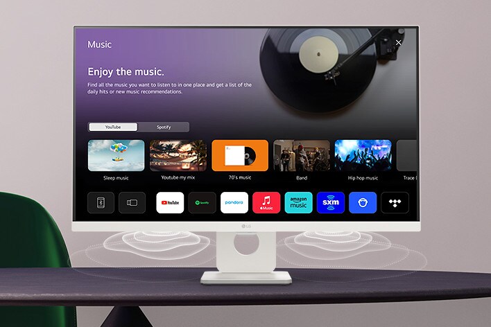 A tela do monitor inteligente colocada na mesa exibe a tela do MUSIC APP