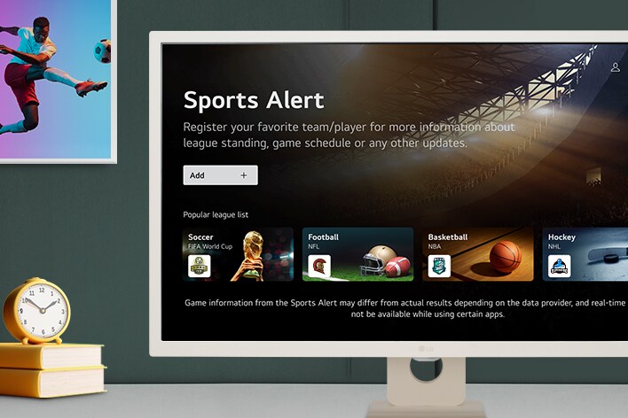  Monitor LG exibindo alerta esportivo com opções de futebol, futebol americano, basquete e hóquei no menu.