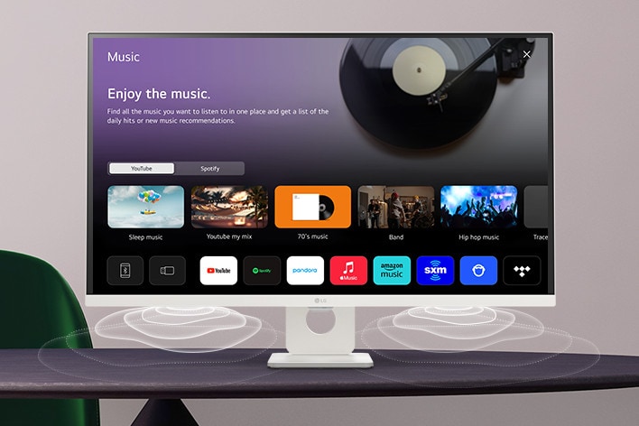 A tela do monitor inteligente colocada na mesa exibe a tela do MUSIC APP