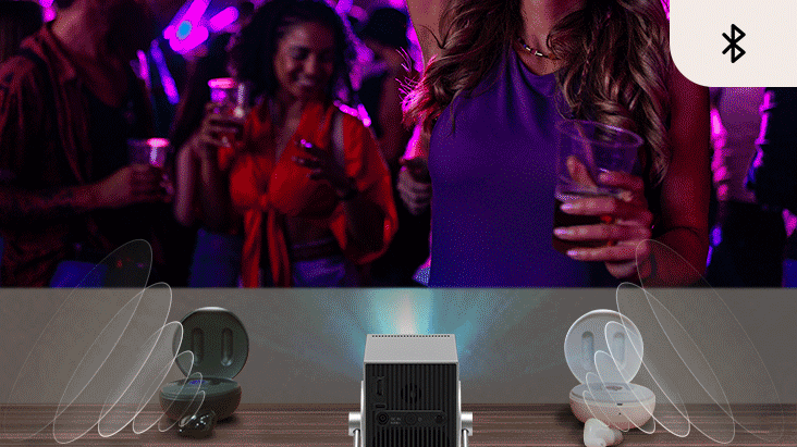 Uma imagem de som proveniente de fones de ouvido conectados por Bluetooth e outra imagem de som se espalhando pelo alto-falante integrado.