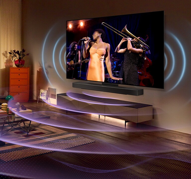 Imagem da TV LG OLED numa sala mostrando um show musical. Linhas curvas azuis, representando o som da TV, e linhas curvas roxas, representando o som da Soundbar, preenchem o espaço.