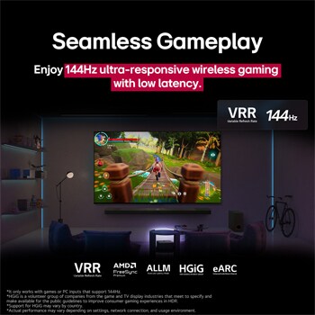 A dimly lit living room with a game screen depicted on the QNED9M. Zero Connect Box sits inside a coffee table. Text talks about 144Hz ultra-responsive wireless gaming with low latency.