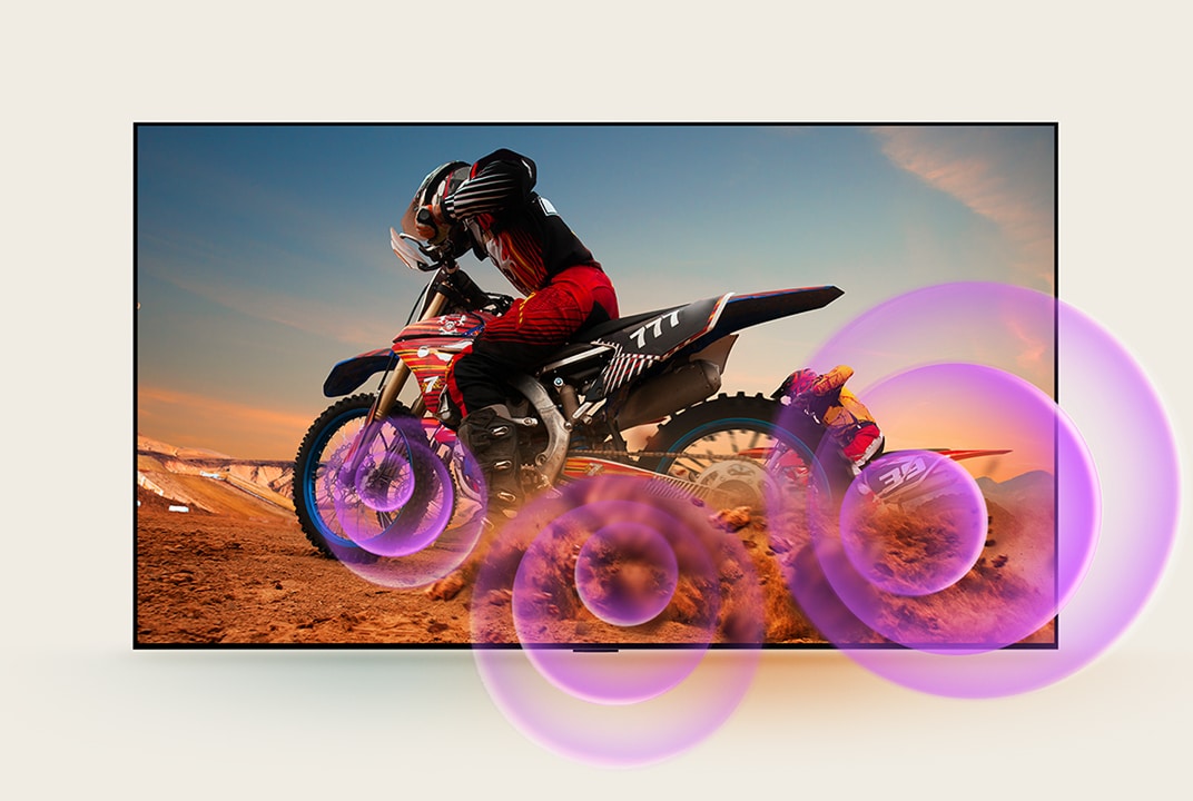 LG TV displays a man on a motorcycle with purple abstract circles emanating from the wheels to visualise sound emission.