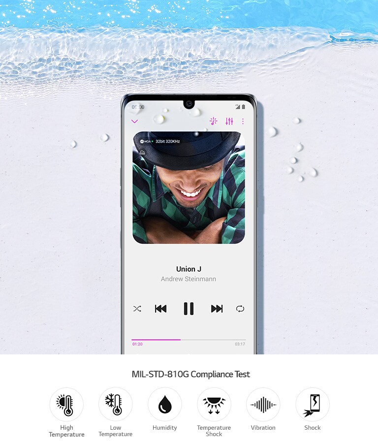 LG VELVET lying on the sandy beach.