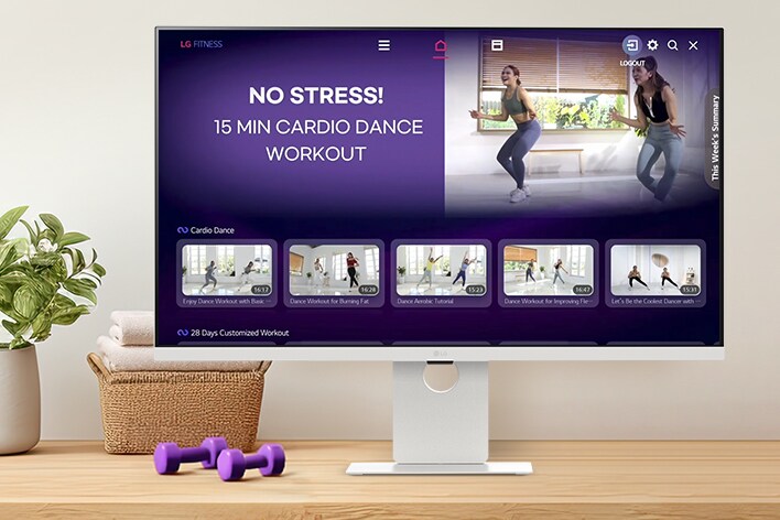 The LG Smart Monitor screen is showing various LG Fitness videos.