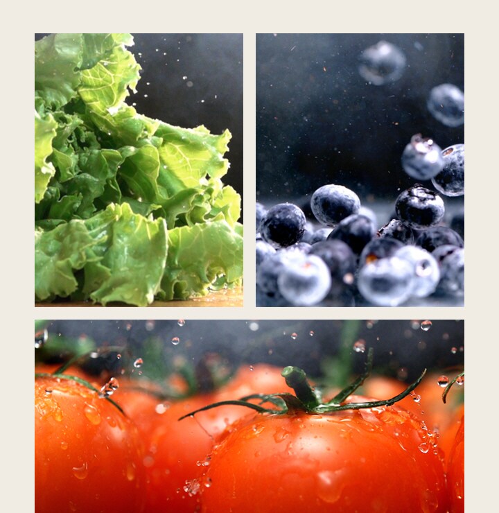 An close up video of water dripping from crisp green lettuce is next to a close up video of water falling on fresh red tomatoes, is next to a video of bright wet blueberries moving around.