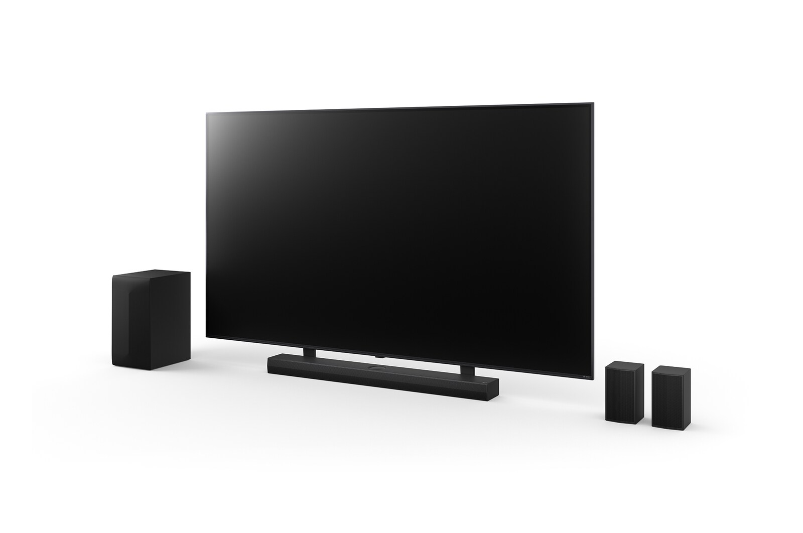Angled view of 75inch LG QNED, LG Soundbar S70TR, Rear Speakers, and subwoofer