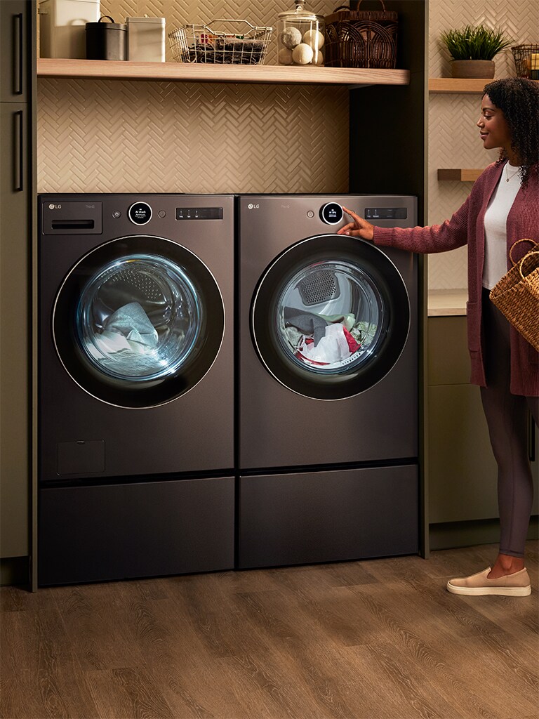 This is an image of a washing machine placed in a laundry room.