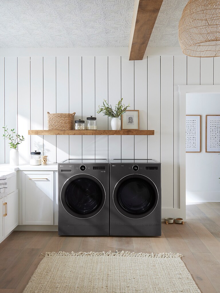 This is an image of a washing machine placed in a laundry room.