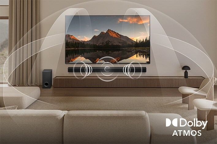 Salon confortable, éclairé, LG TV OLED et LG Soundbar. L’écran affiche un gros plan d’une guitare électrique jouée. Graphiques montrant Dolby Atmos remplir l’espace d’un Surround. Dolby Atmos au coin.
