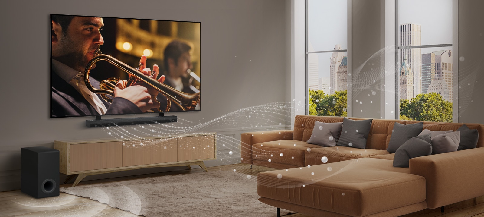 Une barre de son LG, un téléviseur de LG et un caisson de basses se trouvent dans un appartement urbain moderne. La barre de son LG projette trois branches d’ondes sonores composées de gouttelettes blanches qui flottent au-dessus du sol. À côté de la barre de son se trouve un caisson de basses, qui crée un effet sonore à partir du bas. 