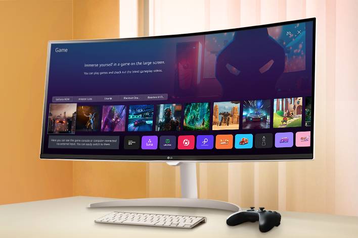 L’écran du LG Smart Monitor posé sur la table affiche l’écran de l’application JEU.