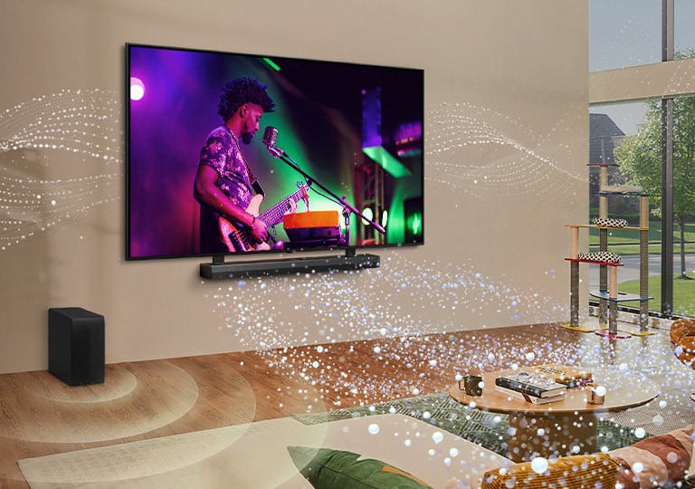 Un LG TV et une barre de son LG sont montés sur le mur d’un salon et des graphiques lumineux remplissent la pièce.