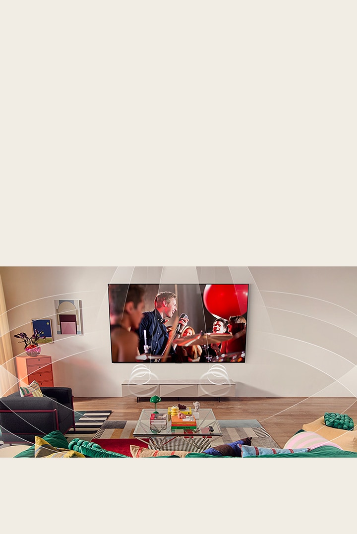 Sala de estar con un televisor LG montado en la pared. Las ondas sonoras se representan gráficamente para llenar el espacio, mostrando cómo los canales virtuales 9.1.2 crean una experiencia de sonido envolvente para el usuario.