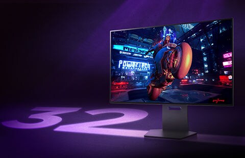 Na obrazovce monitoru Ultra Gear se zobrazuje scéna ze hry a vedle monitoru je napsáno číslo 32.