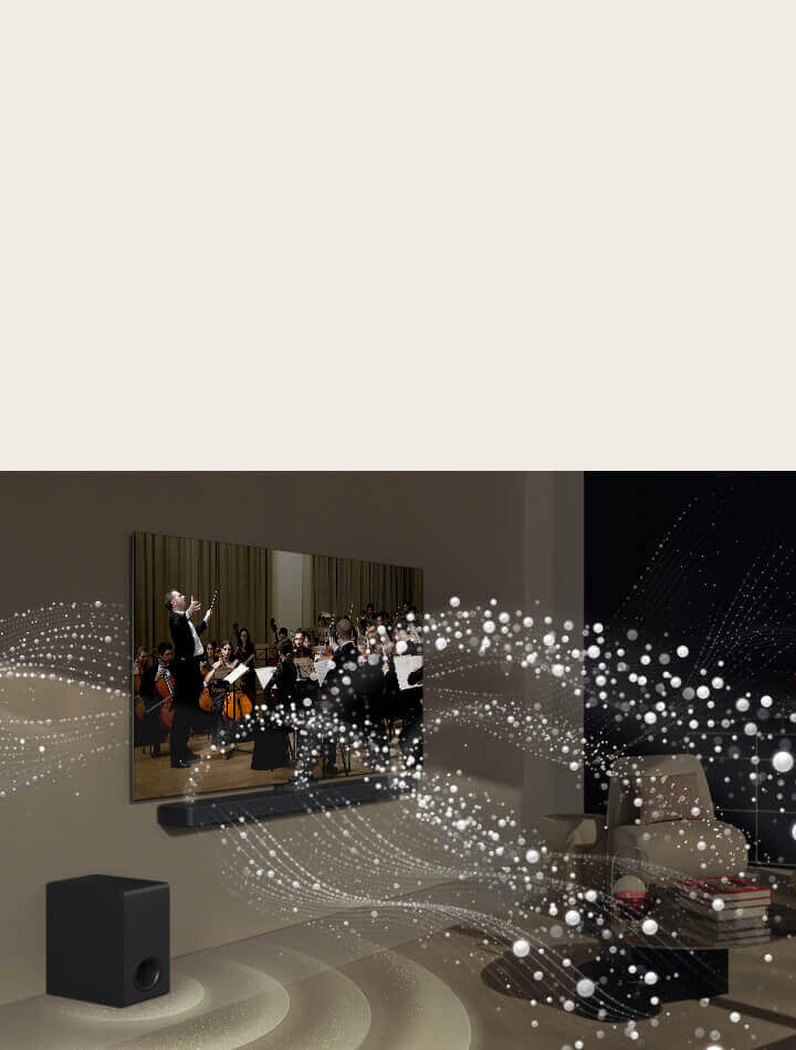 Una soundbar e un TV LG in salotto mentre si vede un concerto. Onde bianche di goccioline che rappresentano le onde sonore vengono sparate verso l'alto e in avanti dalla soundbar e si proiettano dal TV, mentre il subwoofer crea un effetto sonoro dal basso.