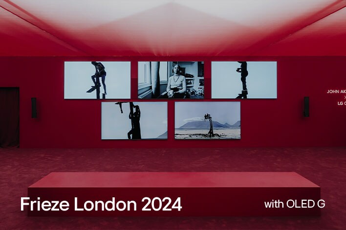 Red room with multiple LG OLED G depicting art works.	