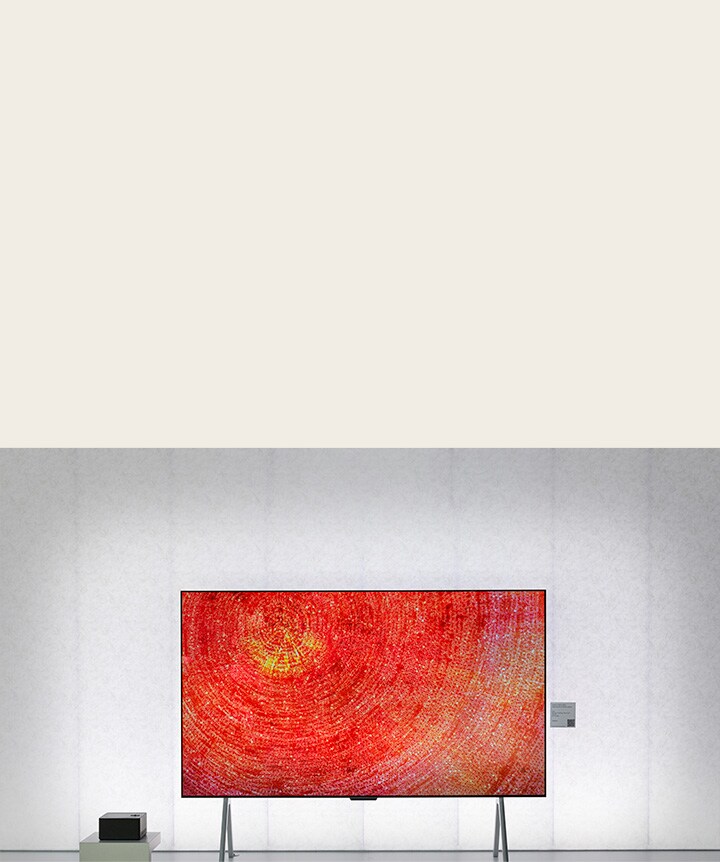 LG TV standing side by side with a Zero Connect Box.	