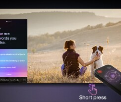 LG AI Magic Remote in front of an LG TV screen. On the screen is a personalized greeting from the LG AI with custom keywords based on the user's search and watch history. By the remote is an icon and label showing that the AI Concierge functionality is easily accessible with one short press on the AI button.