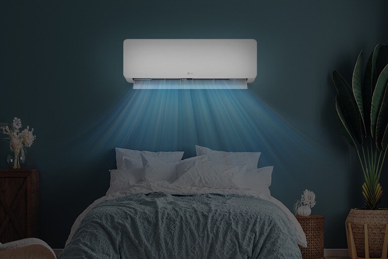  LG air conditioner installed above a bed in a cozy bedroom, releasing cool blue airflow over the sleeping area.