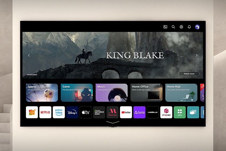The TV with LG webOS screen is on the wall.