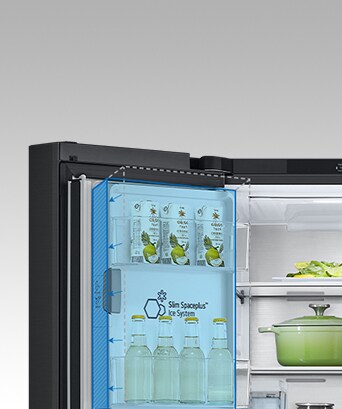 Inside the refrigerator, a slim indoor ice maker is highlighted in blue and the refrigerator is full of ingredients	