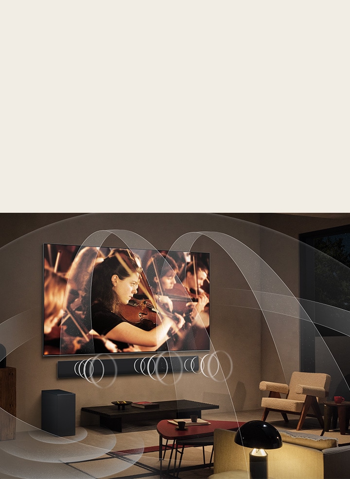 Salón con un televisor LG OLED y una barra de sonido LG con gráficos que representan cómo ambos dispositivos llenan el espacio con sonido multisurround.	