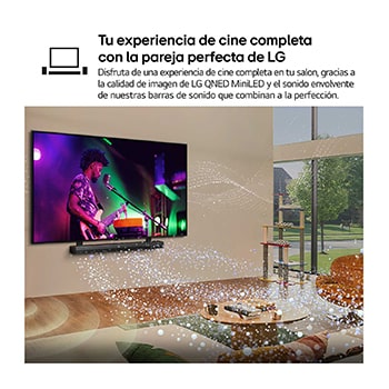 Una niña y un perro están sentados frente a un televisor LG QNED TV montado en una pared con una barra de sonido LG Soundbar. En pantalla muestra a tres elefantes caminando hacia adelante. El título hace referencia a cómo cada acción es más emocionante en una pantalla gigante.