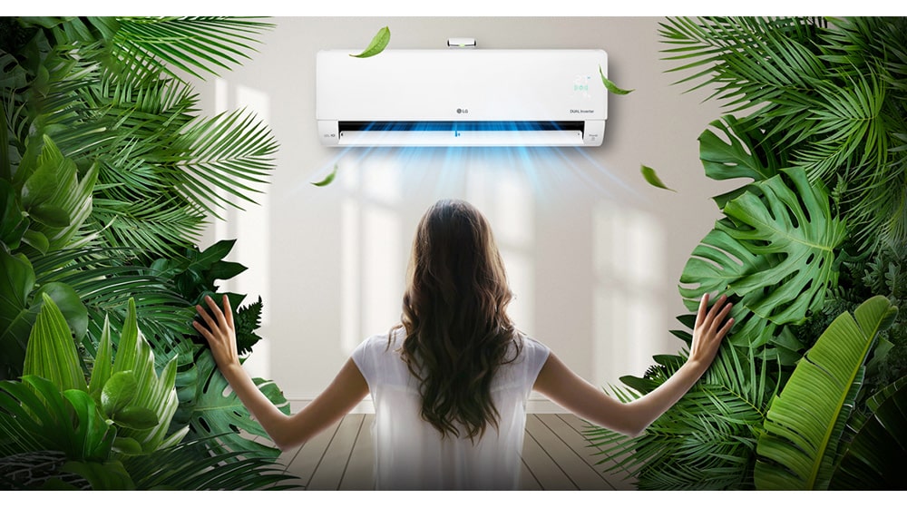 A woman watching the air conditioner in the cool breeze in the thick forest.