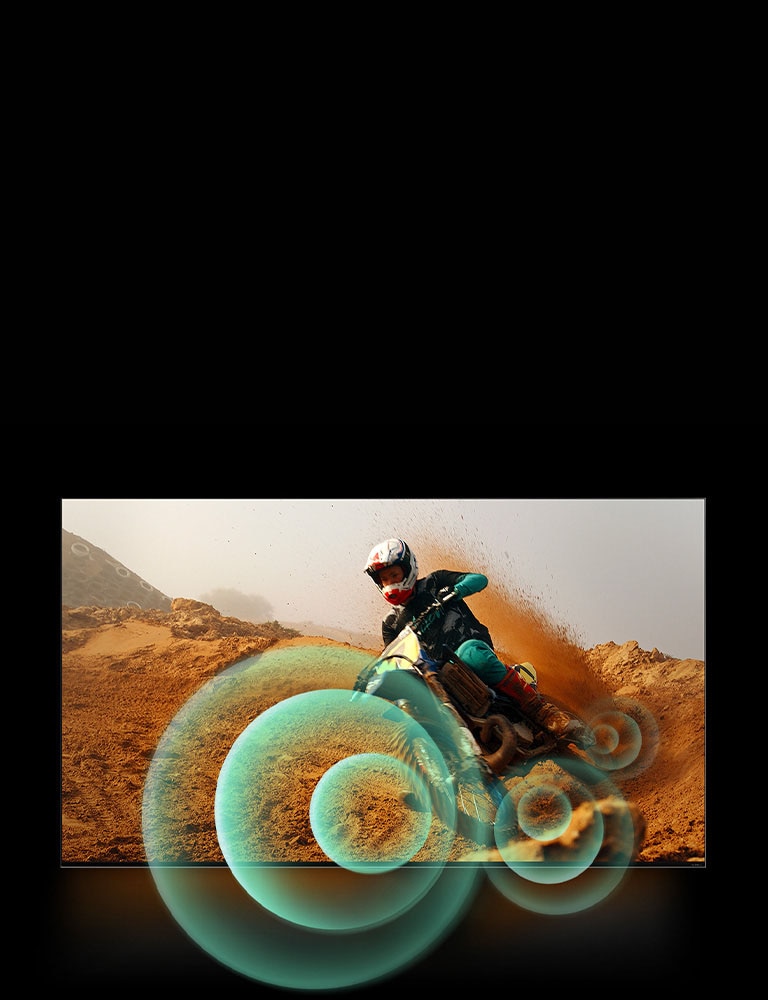 A man riding a motorbike on a dirt track with bright circle graphics around the motorbike.	