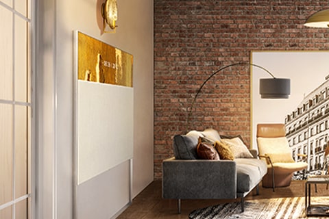 EASEL vu de côté, positionné au ras du mur et se fondant avec la décoration du salon.