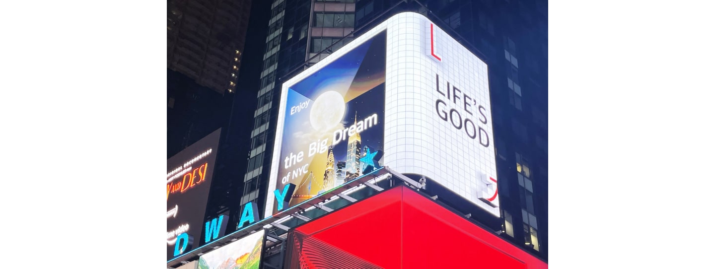 LG's digital billboard in Time Square, New York displaying an illustration of NYC with the phrase 'Life's Good'