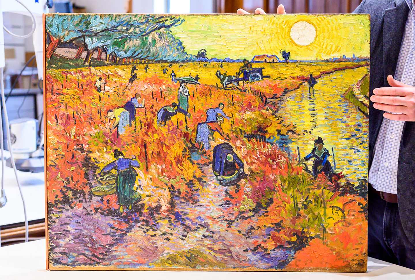 “The Red Vineyards at Arles” painting by Vincent Van Gogh. 