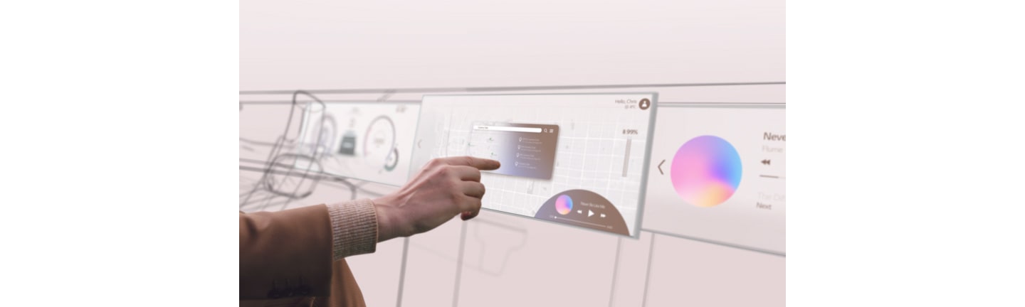 A screenshot from LG VS’s online concept video showing a driver using the digital screen inside the LG-designed digital cockpit.